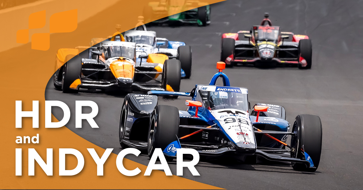 HDR broadcasting capture and INDYCAR formula 1 racecars running around a race track