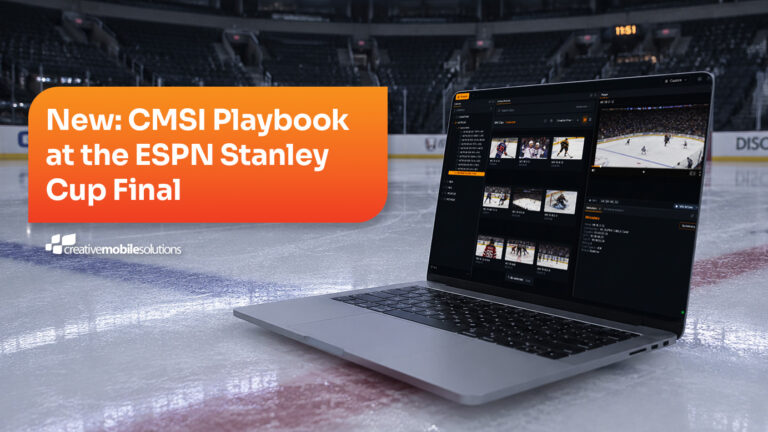 Laptop featuring CMSI Playbook sits on the ice at a hockey rink