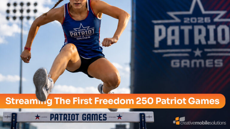A high-school student female athlete jumps over a track hurdle while wearing a Freedom 250 Patriot Games jersey